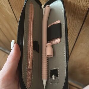 Apple Pencil with pink case and rubber cover